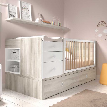 Cuna convertible en cama infantil y escritorio